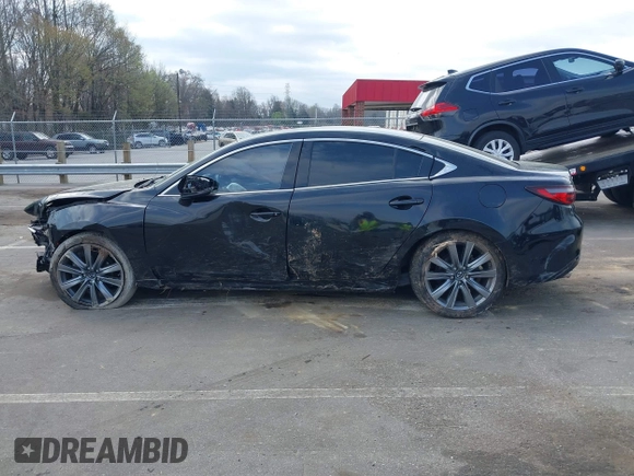 2018 Mazda 6 Touring with VIN JM1GL1VM2J1313375, listed as a IAAI auction lot 41848648 with 93,717 mi miles and . Bid and sale history available at DreamBid. Image 15.