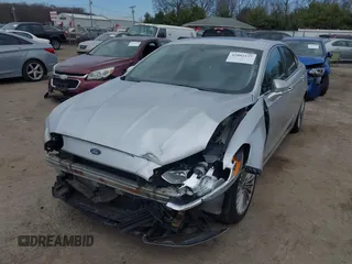 2013 Ford Fusion Titanium with VIN 3FA6P0K93DR260275, listed as a IAAI auction lot 42002127 with 126,751 mi miles. Bid and sale history available at carsss.com. Image 2.