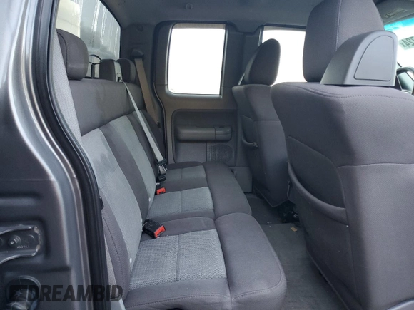 2004 Ford F-150 XLT with VIN 1FTRX12514KD37885, listed as a Copart auction lot 73998724 with 164,189 mi miles and Salvage Title. Bid and sale history available at carsss.com. Image 10.