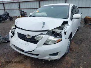 2010 Toyota Corolla with VIN JTDBU4EE2AJ074525, listed as a IAAI auction lot 41581276 with 195,679 mi miles. Bid and sale history available at carsss.com. Image 6.