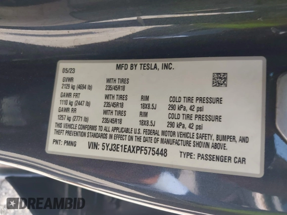 2023 Tesla Model 3 with VIN 5YJ3E1EAXPF575448, listed as a IAAI auction lot 42019288 with 33,859 mi miles and . Bid and sale history available at carsss.com. Image 9.