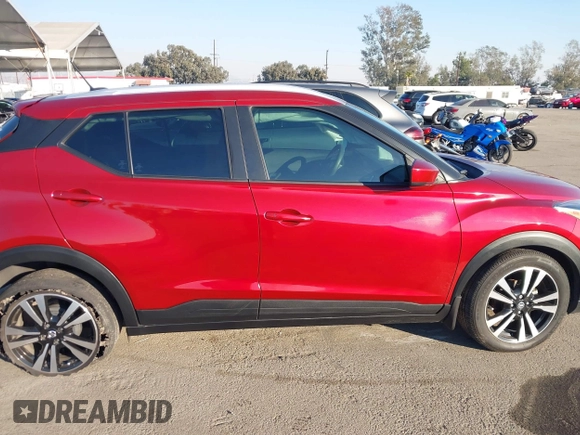 2019 Nissan Kicks SV with VIN 3N1CP5CU3KL493055, listed as a IAAI auction lot 41313642 with 57,520 mi miles. Bid and sale history available at carsss.com. Image 12.
