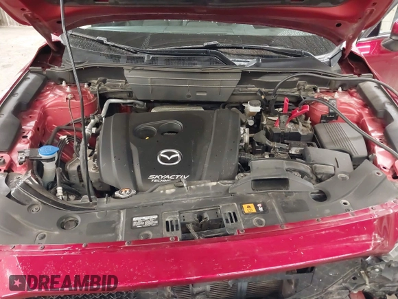 2018 Mazda CX-5 Grand Touring with VIN JM3KFBDM5J0414013, listed as a IAAI auction lot 42013479 with 88,225 mi miles and . Bid and sale history available at DreamBid. Image 10.