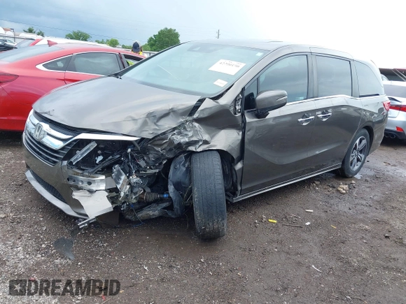 2019 Honda Odyssey Touring with VIN 5FNRL6H81KB038790, listed as a IAAI auction lot 42200190 with 131,761 mi miles and . Bid and sale history available at DreamBid. Image 18.
