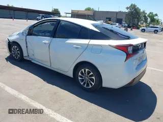 2019 Toyota Prius L Eco z VIN JTDKARFU5K3089070, wystawiony jako IAAI lot #42302536 z przebiegiem 122 911 mil mil oraz . Historia ofert i sprzedaży dostępna na DreamBid. Obrazek 3.