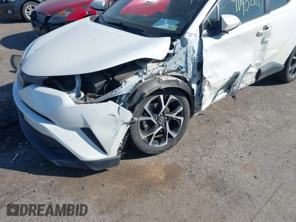 2018 Toyota C-HR XLE with VIN JTNKHMBX3J1011066, listed as a IAAI auction lot 41902651 with 66,874 mi miles. Bid and sale history available at carsss.com. Image 6.