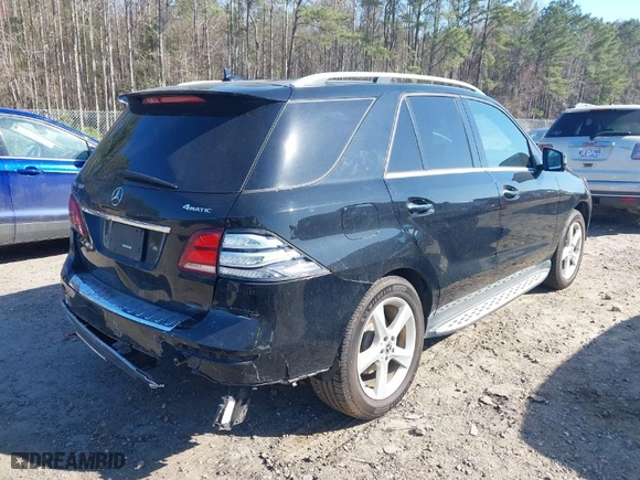 2017 Mercedes-Benz GLE with VIN 4JGDA5HB0HA972569, listed as a IAAI auction lot 41784301 with 87,214 mi miles. Bid and sale history available at carsss.com. Image 4.