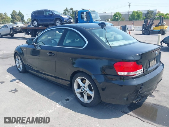 2011 BMW 1 Series 128i with VIN WBAUP9C51BVL90277, listed as a IAAI auction lot 42572690 with 153,427 mi miles and . Bid and sale history available at DreamBid. Image 3.