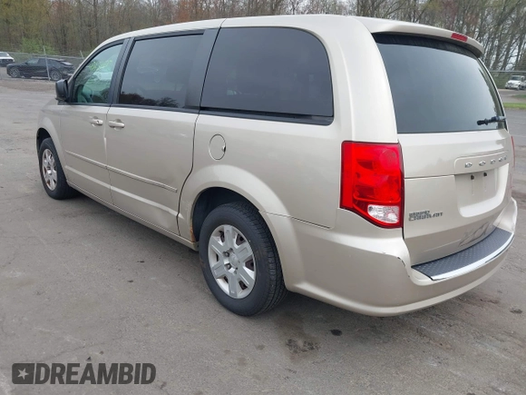 2012 Dodge Grand Caravan SE with VIN 2C4RDGBG4CR298996, listed as a IAAI auction lot 42133423 with 70,354 mi miles and . Bid and sale history available at DreamBid. Image 3.