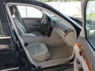 2005 Mercedes-Benz E-Class 3.2L with VIN WDBUF65J05A634879, listed as a IAAI auction lot 39904592 with 4,835 mi miles. Bid and sale history available at carsss.com. Image 5.
