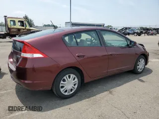 2011 Honda Insight with VIN JHMZE2H31BS008097, listed as a Copart auction lot 60780625 with 111,688 mi miles and Salvage title. Bid and sale history available at DreamBid. Image 3.