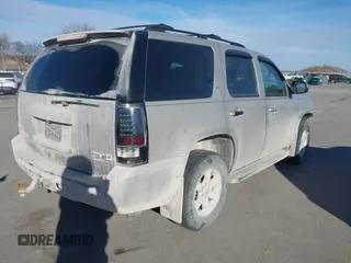 2009 GMC Yukon SLT w/4SA with VIN 1GKFK33039J117245, listed as a IAAI auction lot 41421302 with 199,864 mi miles. Bid and sale history available at carsss.com. Image 4.