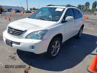 2006 Lexus RX 400h with VIN JTJHW31U160005783, listed as a IAAI auction lot 41878471 with 157,087 mi miles and . Bid and sale history available at DreamBid. Image 2.