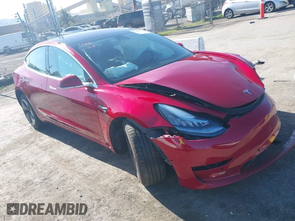 2018 Tesla Model 3 Long Range Battery z VIN 5YJ3E1EA4JF022284, wystawiony jako IAAI lot #41422203 z przebiegiem 71 521 mil mil oraz . Historia ofert i sprzedaży dostępna na DreamBid. Obrazek 1.