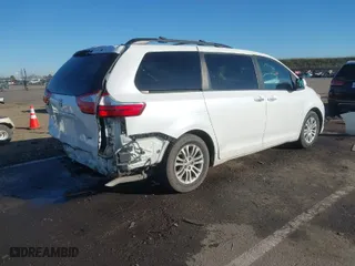 2016 Toyota Sienna XLE with VIN 5TDYK3DC9GS755187, listed as a IAAI auction lot 41344816 with 106,694 mi miles. Bid and sale history available at carsss.com. Image 4.