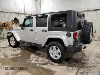 2008 Jeep Wrangler Unlimited Sahara z VIN 1J4GA59168L551767, wystawiony jako Copart lot #49809985 z przebiegiem 151 176 mil mil oraz Nie do naprawy • Non repairable. Historia ofert i sprzedaży dostępna na DreamBid. Obrazek 2.