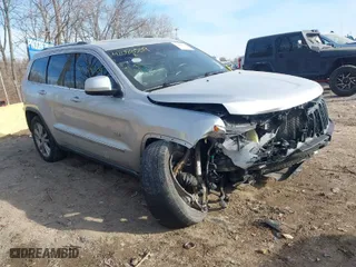 2011 Jeep Grand Cherokee Laredo with VIN 1J4RR4GTXBC678304, listed as a IAAI auction lot 41088309 with 139,559 mi miles. Bid and sale history available at carsss.com. Image 1.