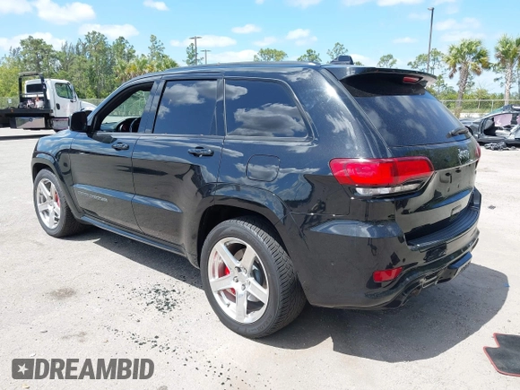 2017 Jeep Grand Cherokee SRT z VIN 1C4RJFDJ8HC653924, wystawiony jako IAAI lot #42108099 z przebiegiem 61 560 mil mil oraz . Historia ofert i sprzedaży dostępna na DreamBid. Obrazek 3.