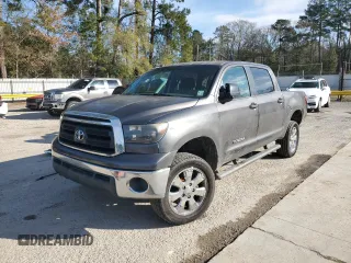 2012 Toyota Tundra with VIN 5TFEM5F1XCX048298, listed as a Copart auction lot 87471574 with 224,808 mi miles and Salvage title. Bid and sale history available at DreamBid. Image 1.