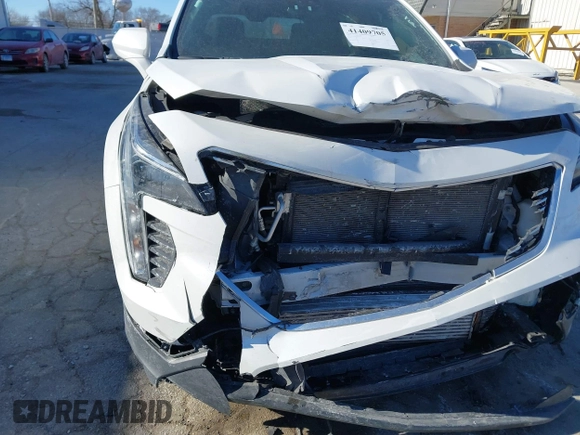2022 Cadillac XT4 AWD Luxury with VIN 1GYFZBR42NF170554, listed as a IAAI auction lot 41409705 with 38,727 mi miles and . Bid and sale history available at carsss.com. Image 6.