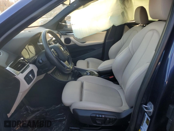 2018 BMW X1 xDrive28i with VIN WBXHT3C32J3H31391, listed as a Copart auction lot 88584855 with 32,441 mi miles and Salvage Title. Bid and sale history available at DreamBid. Image 7.