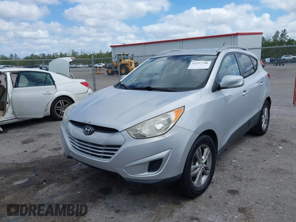 2010 Hyundai Tucson GLS with VIN KM8JU3AC0AU019205, listed as a IAAI auction lot 42157796 with 175,246 mi miles and . Bid and sale history available at DreamBid. Image 6.