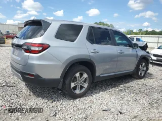 2023 Honda Pilot EX-L 8 Passenger with VIN 5FNYG2H47PB000333, listed as a Copart auction lot 61880844 with 0 mi miles and Salvage Title. Bid and sale history available at carsss.com. Image 3.