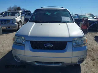 2005 Ford Escape Hybrid with VIN 1FMCU95H45KD16867, listed as a IAAI auction lot 41661311 with 206,698 mi miles. Bid and sale history available at carsss.com. Image 12.
