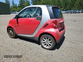 2009 Smart fortwo Pure with VIN WMEEJ31X29K236894, listed as a Copart auction lot 60328875 with 109,337 mi miles and Clean title. Bid and sale history available at DreamBid. Image 2.