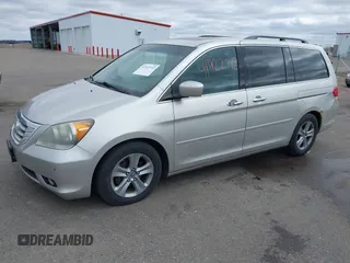2008 Honda Odyssey Touring with VIN 5FNRL38928B109012, listed as a IAAI auction lot 41922712 with 241,589 mi miles. Bid and sale history available at carsss.com. Image 2.
