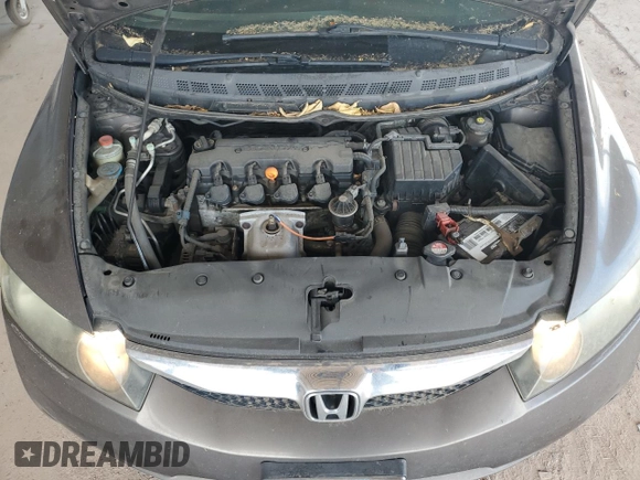 2009 Honda Civic LX z VIN 19XFA16599E050691, wystawiony jako Copart lot #58538835 z przebiegiem 162 377 mil mil oraz Czysty tytuł • Clean title. Historia ofert i sprzedaży dostępna na DreamBid. Obrazek 11.