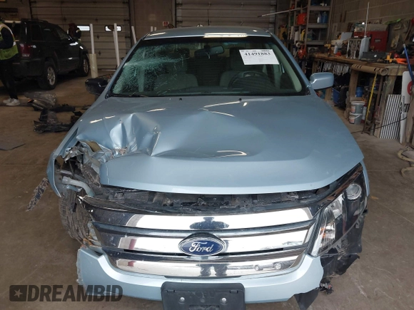 2010 Ford Fusion Hybrid z VIN 3FADP0L34AR276532, wystawiony jako IAAI lot #41491883 z przebiegiem 159 076 mil mil oraz . Historia ofert i sprzedaży dostępna na DreamBid. Obrazek 12.