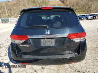 2014 Honda Odyssey EX-L with VIN 5FNRL5H69EB121140, listed as a Copart auction lot 79698724 with 169,626 mi miles and Salvage Title. Bid and sale history available at DreamBid. Image 6.