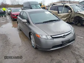 2007 Honda Civic Sdn LX with VIN 2HGFA16537H310702, listed as a IAAI auction lot 41913848 with 301,029 mi miles. Bid and sale history available at carsss.com. Image 1.
