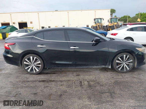 2016 Nissan Maxima SR with VIN 1N4AA6AP9GC428938, listed as a IAAI auction lot 42419663 with 121,501 mi miles and . Bid and sale history available at DreamBid. Image 13.