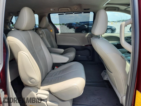 2012 Toyota Sienna XLE AAS с VIN 5TDYK3DC9CS242080, выставлен на аукционе Copart как лот 58374845 с пробегом 152 411 миль миль и Списание • Salvage title. История ставок и продаж доступна на DreamBid. Изображение 11.