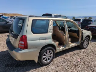 2005 Subaru Forester XS with VIN JF1SG65635H714028, listed as a Copart auction lot 58395405 with 98,134 mi miles and Salvage title. Bid and sale history available at DreamBid. Image 3.