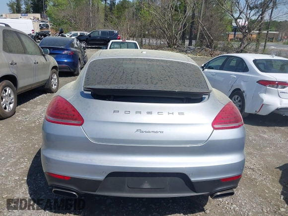 2014 Porsche Panamera z VIN WP0AA2A70EL007514, wystawiony jako IAAI lot #41910398 z przebiegiem 72 434 mil mil oraz . Historia ofert i sprzedaży dostępna na DreamBid. Obrazek 16.
