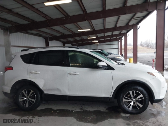 2018 Toyota RAV4 XLE with VIN JTMRFREV6JD222115, listed as a IAAI auction lot 41505367 with 118,126 mi miles. Bid and sale history available at carsss.com. Image 13.