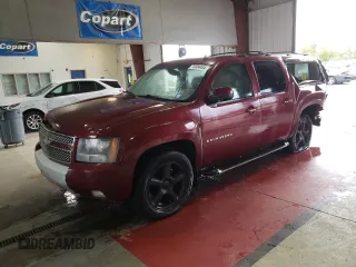 2009 Chevrolet Suburban LT w/1LT with VIN 1GNFK26389R149645, listed as a Copart auction lot 74804484 with 265,501 mi miles and Salvage Title. Bid and sale history available at carsss.com. Image 1.