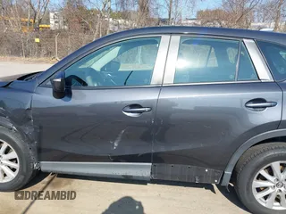2015 Mazda CX-5 Sport with VIN JM3KE4BY1F0526755, listed as a IAAI auction lot 41768916 with 197,675 mi miles. Bid and sale history available at carsss.com. Image 14.