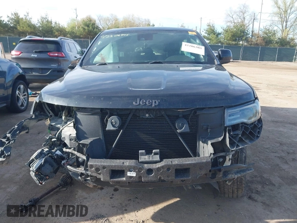 2018 Jeep Grand Cherokee Overland with VIN 1C4RJFCT1JC314558, listed as a IAAI auction lot 42206305 with 83,570 mi miles and . Bid and sale history available at DreamBid. Image 13.