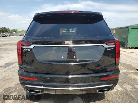 2023 Cadillac XT6 FWD Luxury z VIN 1GYKPAR45PZ187400, wystawiony jako Copart lot #54562335 z przebiegiem 16 953 mil mil oraz Szkoda całkowita • Salvage title. Historia ofert i sprzedaży dostępna na DreamBid. Obrazek 6.