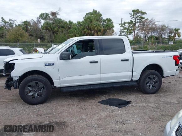 2024 Ford F-150 Lightning XLT with VIN 1FTVW3LKXRWG01185, listed as a IAAI auction lot 41679606 with 4,961 mi miles and . Bid and sale history available at DreamBid. Image 15.
