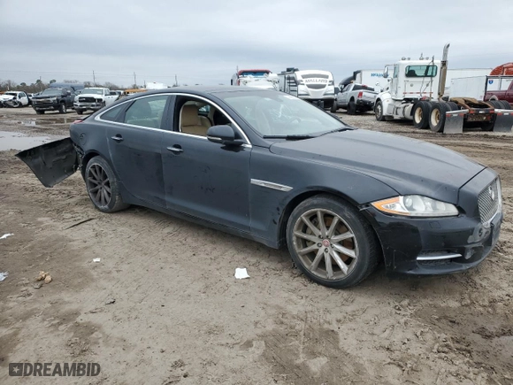2015 Jaguar XJ with VIN SAJWA1CZ1F8V75808, listed as a Copart auction lot 44436825 with 0 mi miles and Salvage Title. Bid and sale history available at carsss.com. Image 4.