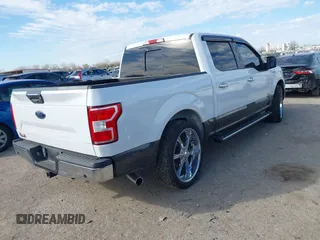 2018 Ford F-150 XL with VIN 1FTEW1C59JKD98218, listed as a IAAI auction lot 41406012 with 103,435 mi miles. Bid and sale history available at carsss.com. Image 4.