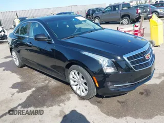 2018 Cadillac ATS RWD z VIN 1G6AA5RX1J0160018, wystawiony jako IAAI lot #41838988 z przebiegiem 63 586 mil mil oraz . Historia ofert i sprzedaży dostępna na DreamBid. Obrazek 1.