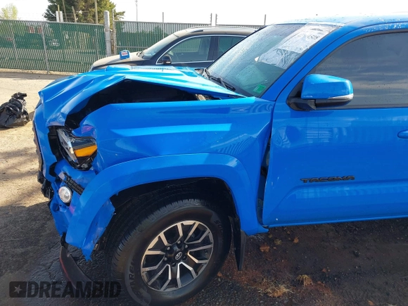 2021 Toyota Tacoma SR z VIN 3TYCZ5AN7MT008274, wystawiony jako IAAI lot #42091508 z przebiegiem 59 371 mil mil oraz . Historia ofert i sprzedaży dostępna na DreamBid. Obrazek 18.