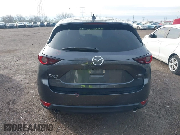 2020 Mazda CX-5 Touring with VIN JM3KFBCM8L0863951, listed as a IAAI auction lot 41921635 with 88,629 mi miles. Bid and sale history available at carsss.com. Image 16.