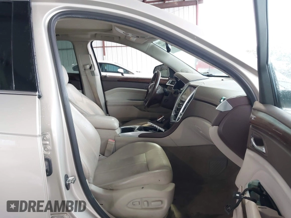 2013 Cadillac SRX Performance Collection z VIN 3GYFNCE31D5611616, wystawiony jako IAAI lot #42119169 z przebiegiem 159 019 mil mil oraz . Historia ofert i sprzedaży dostępna na DreamBid. Obrazek 5.